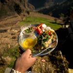 Siddu - Mouth watering and authentic Himachali food over blured mountain background - India